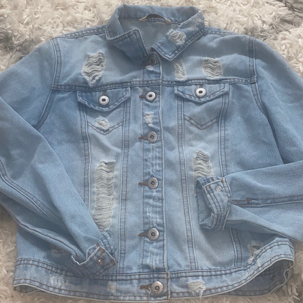 ripped bluejeans jacket